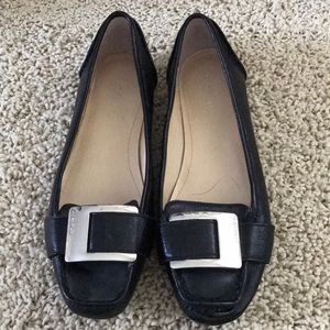 Calvin Klein black leather flats w/ silver buckle